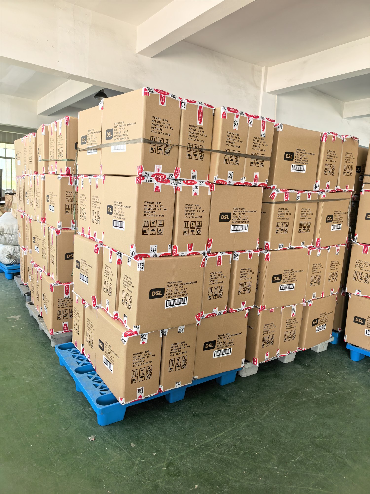 Packed LED beanie orders in the YH Lighting warehouse